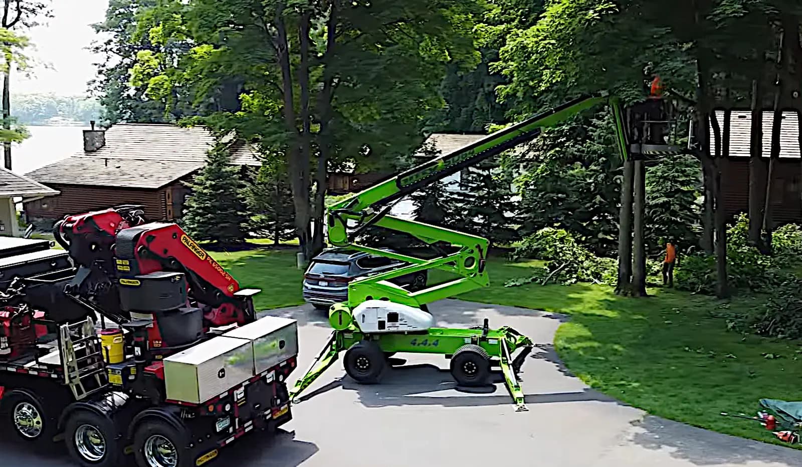 Equipment working on a wooded Central Minnesota property
